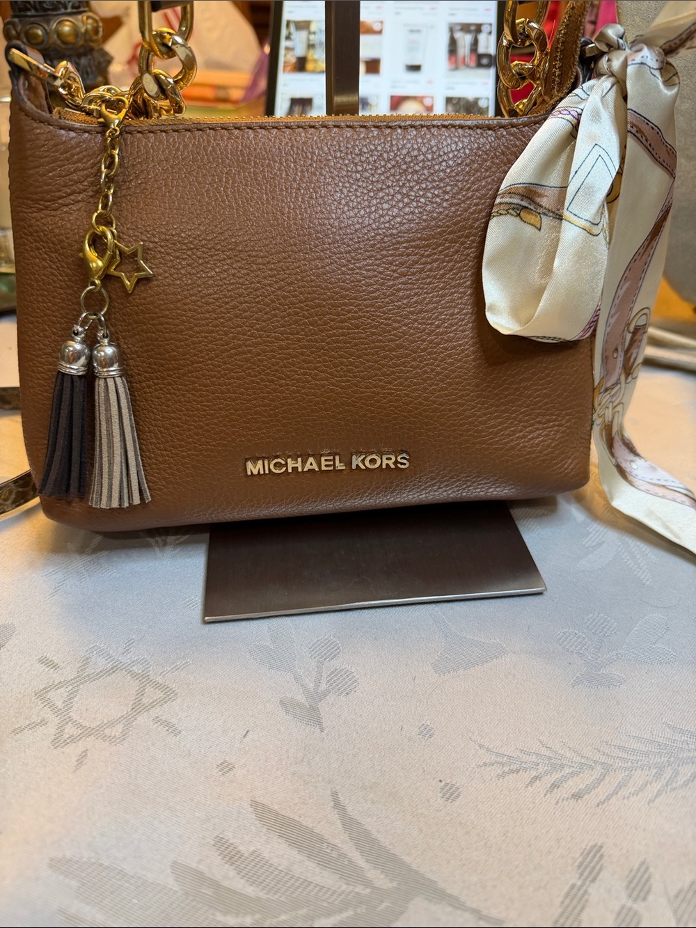 Michael Kors Brown Leather Crossbody with Tassel Charm and Scarf Accent
